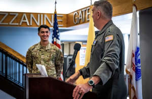 Air Force Gen. Mike Minihan, right, and Senior Airman Connor Runkle at the opening of Sean's Room at Joint Base McGuire-Dix-Lakehurst in October 2023